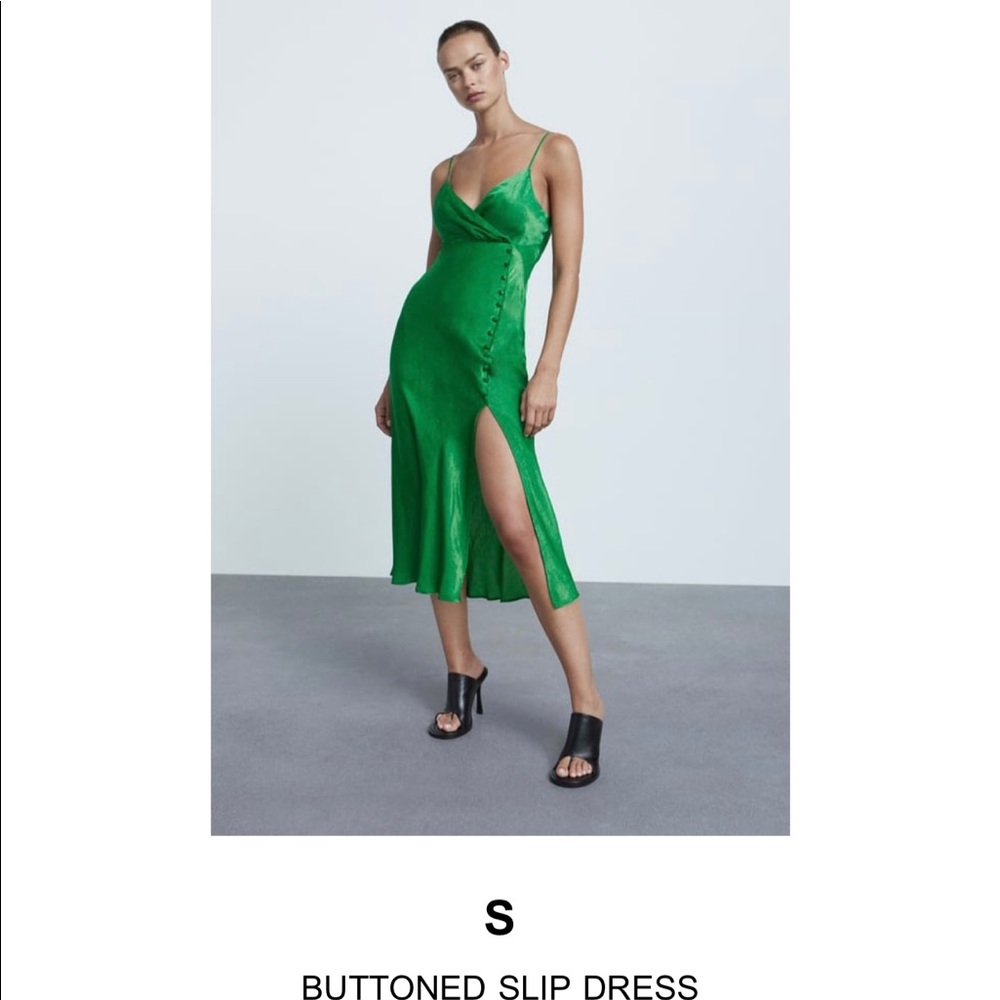 Beautiful and never worn slit button silk dress from Zara.